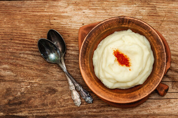 Mashed potato in antique ceramic bowl