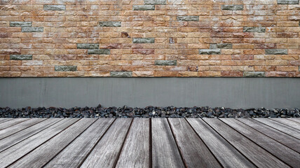 Empty wood floor with brick wall background