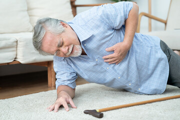 Senior man fell to the ground, Elderly Asian man with chest pain from a heart attack.