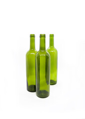 Three empty wine bottles on a white background