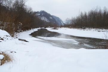 beautiful winter landscape with snowy trees and river