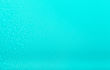 Drops of water on a color background. Selective focus. Blue