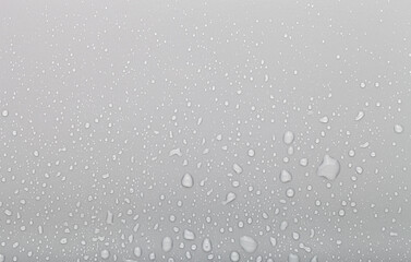 Drops of water on a color background. Grey