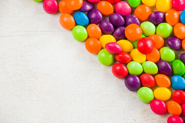 Skittles candy on the table, colorful sweet candy background