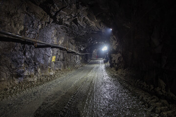 Underground gold mine shaft tunnel drift with light