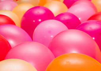 Multicolored magenta and pink bright air balls background close-up