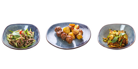 Three dishes: two types of salad and baked potatoes in sauce on a white isolated background. The concept of restaurant service. Business lunch.