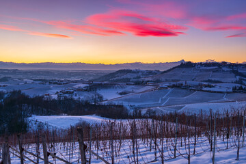 Italy Piedmont: Barolo wine yards unique landscape winter sunset, Novello medieval village castle on hill top, the Alps snow capped mountains background, italian historical heritage grape agriculture - obrazy, fototapety, plakaty