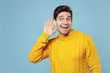 Young caucasian unshaved curious fun student man 20s wear casual knitted cozy yellow fashionable...