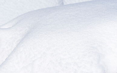 Fototapeta na wymiar Background from fluffy snow close-up.