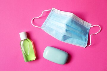 Personal protective equipment supplies during coronavirus COVID-19 epidemic. Hand sanitizer bottle,...