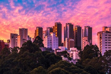 Buildings in sao paulo with colorful and unique sunset sky