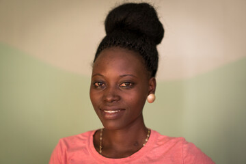 Young candid black African woman portrait in indoors