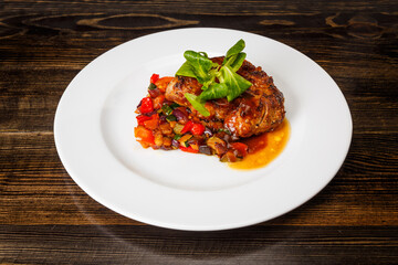Juicy piece of meat with stewed vegetables
