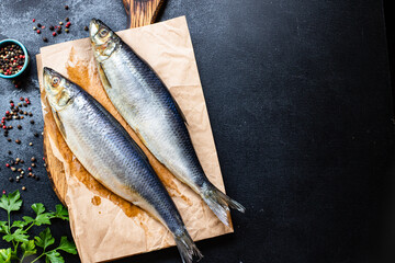 fresh herring fish salted seafood ready to eat on the table pescetarian diet meal outdoor top view copy space food background rustic image