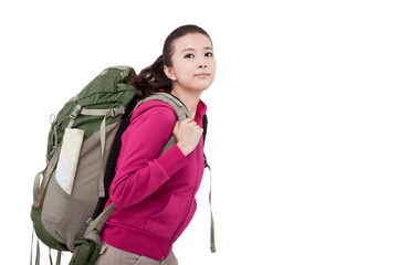 Portrait of a young female carrying backpacker 