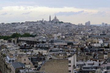 Panorama view of the famous Montmartre borough in the 18th arrondissement with the Basilica of the Sacre Coeur in the middle; France, Europe
