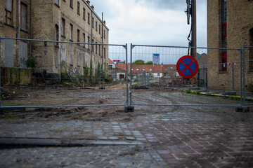 Bruges, Belgium - October 04, 2019: Constuctions behind the fence