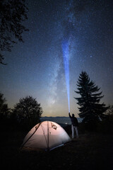 Epic view of the starry sky from the mountain camping