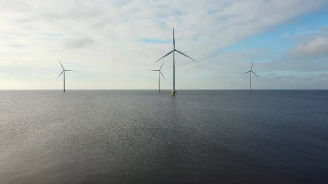 Aerial view on off shore wind turbines off the coast of Flevoland in the IJsselmeer in The Netherlands