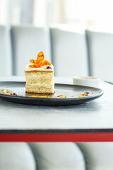 sweet piece of cake biscuit cream dessert slice layers vanilla kurd plate on the table meal snack top view copy space for text food background rustic image