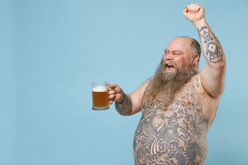 Happy fat pudge obese chubby overweight man has tattooed naked bare big belly hold glass of beer...
