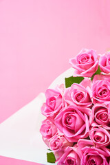 Background of beautiful pink roses with copy space. High quality photo