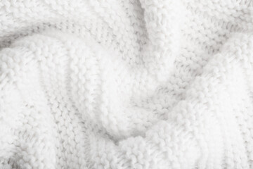 Close up of white knitted textured background. Trendy color.