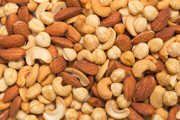Mix of nuts isolated on white background. Top view.