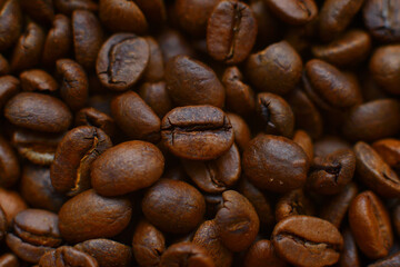 roasted coffee bean background, top view.blurry background.Close up.Copy spase.Macro