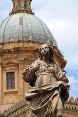 Fototapeta na wymiar statue with cathedral