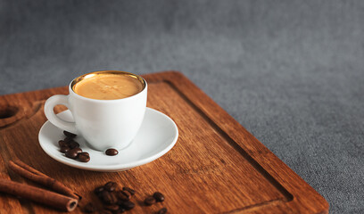 cup of coffee on wood table