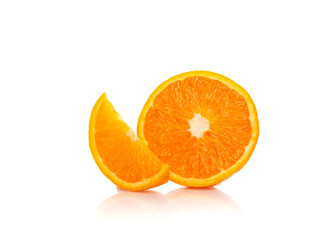 Fresh orange cut in half isolated on white. Selective focus.