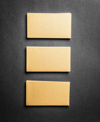 Fototapeta premium Blank golden business card on grey background