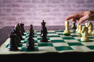Male hand with resign move in chess. Chess game with hand. Chess Game, Strategy and Decision Making.