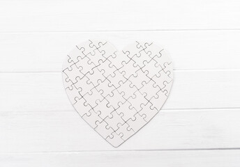 Puzzle in form of heart