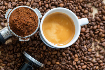 Freshly ground espresso in a portafilter, ready to be made into a hot shot of espresso