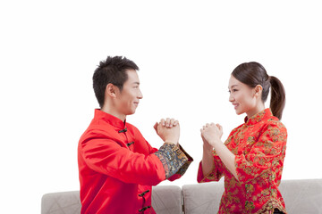Portrait of young couple in Tang suits 