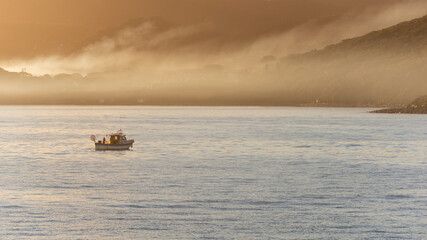 Obraz premium Pescatore all'alba