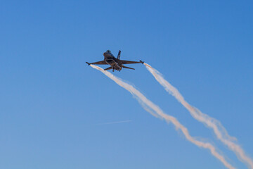 fighter jet flying in the sky