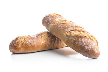 Two crispy fresh baguettes isolated on white background.