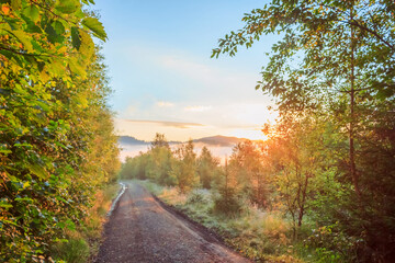 Fototapeta premium Dawn. Road to the mountains