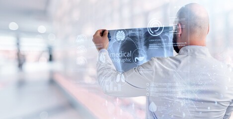 Doctor holding radiography x ray photo on hospital background