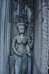 Close-up view of the carvings, statues and sculptures at the ancient khmer temple complex of Angkor Wat