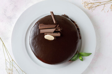 Chocolate cake with mint leaves