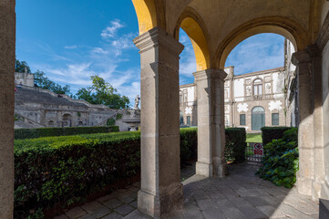 Fototapeta na wymiar Monselice Santuario delle 7 Chiese, view of the arches of the church of San Giorgio in the square of Villa Duodo in a summer day with blue sky and clouds Padua, Veneto, Italy.
