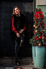 Elegant girl walk in a winter city. Beautiful lady with blond hair. Portrait of beautiful blond...