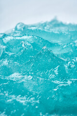 The texture of the blue cosmetic gel. Frozen liquid
