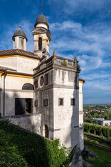 Fototapeta na wymiar Sanctuary of the 7 Churches, architectural detail of the church of San Giorgio with the panorama on a summer day with blue sky and clouds, Monselice, Padua, Veneto, Italy.