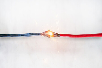 short circuit of electrical wiring sparks molten wires